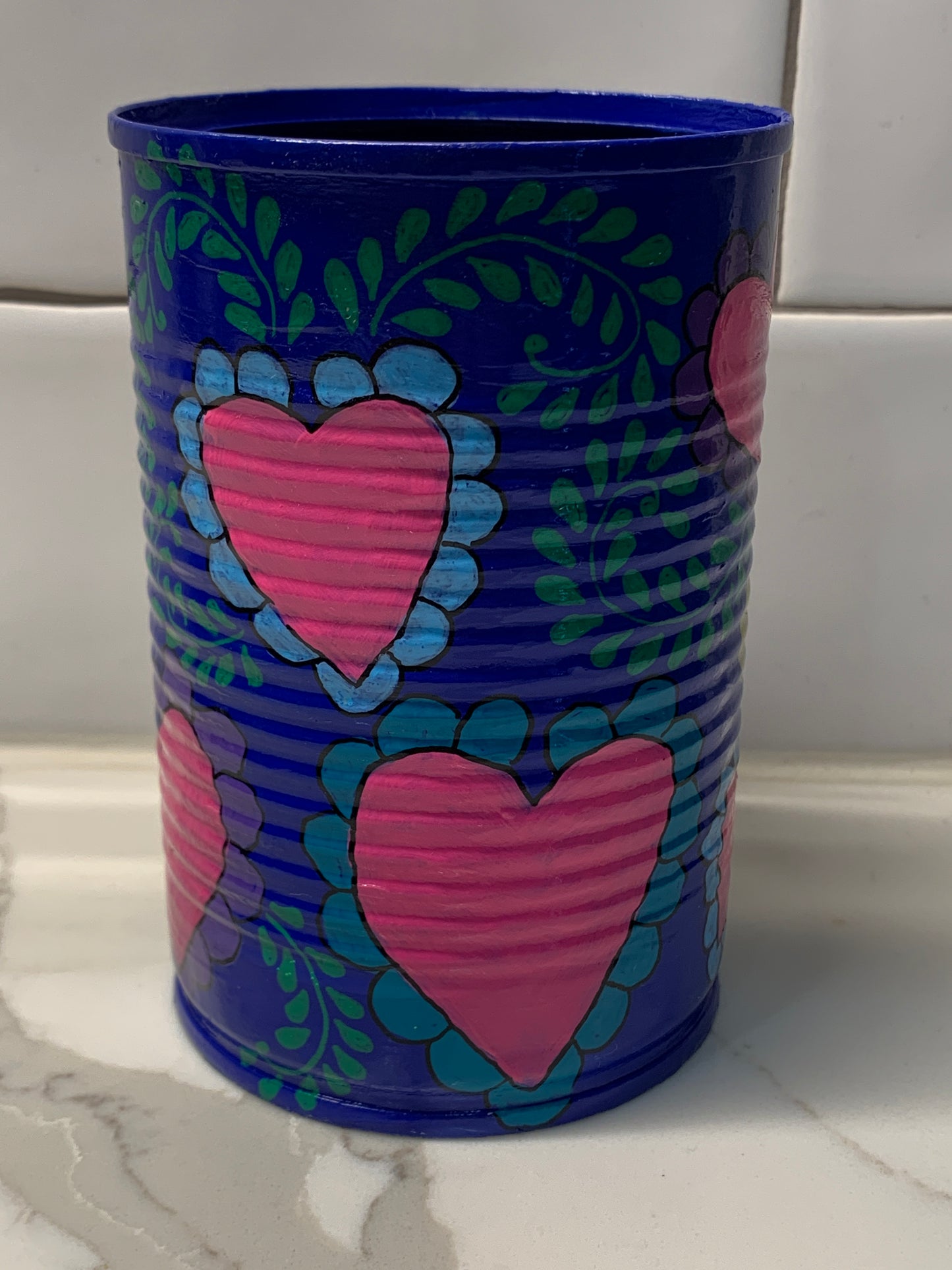 Blue upcycled tins with sacred heart and flowers